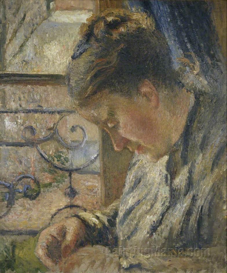 Portrait of Madame Pissarro Sewing near a Window