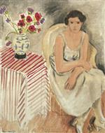 Woman on an armchair - Flowers on the table, or carnations